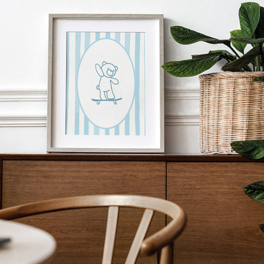 Blue stripe bear on skateboard
